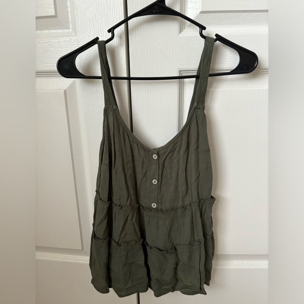 Green top with tie in back, size large